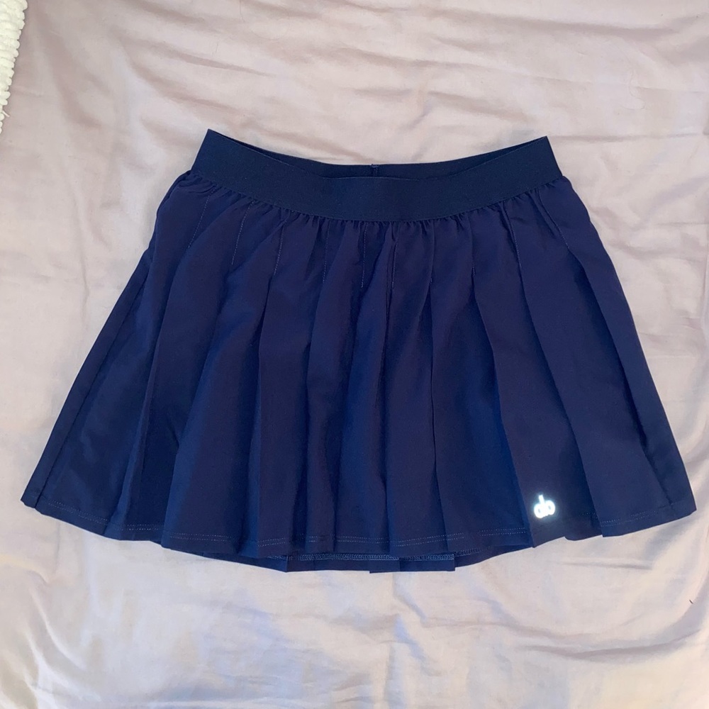 NWOT Alo Yoga Varsity Tennis Skirt, size small (4/6), in color true navy